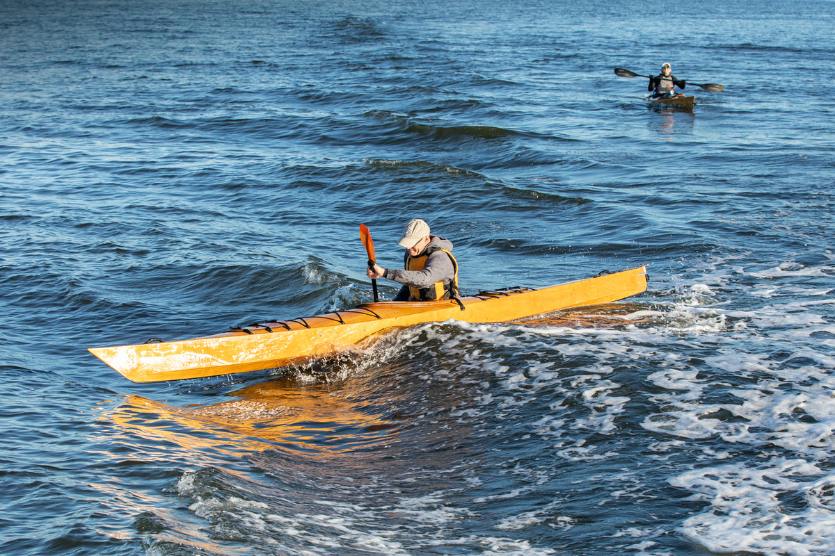 Paddling a Chesapeake 17 wooden kayak in waves