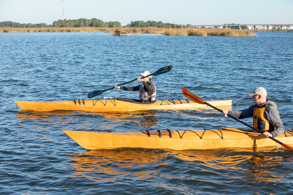 Paddling a Chesapeake 17 (foreground) wooden kayak alongside a Chesapeake 16LT kayak 