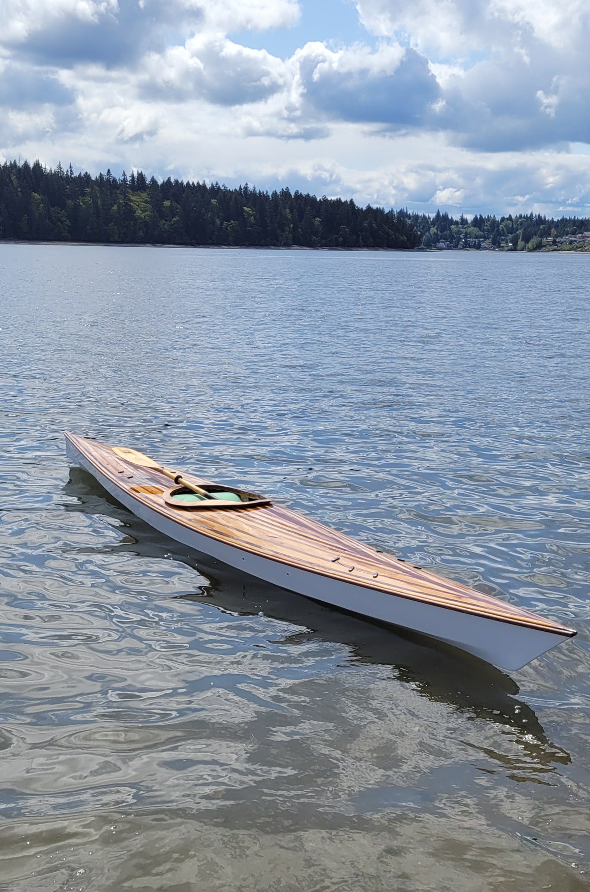Gary N. crafted the deck of his Chesapeake 17 Hybrid (strip planked deck) wooden kayak of hemlock, Douglas fir, cedar, and spruce strips