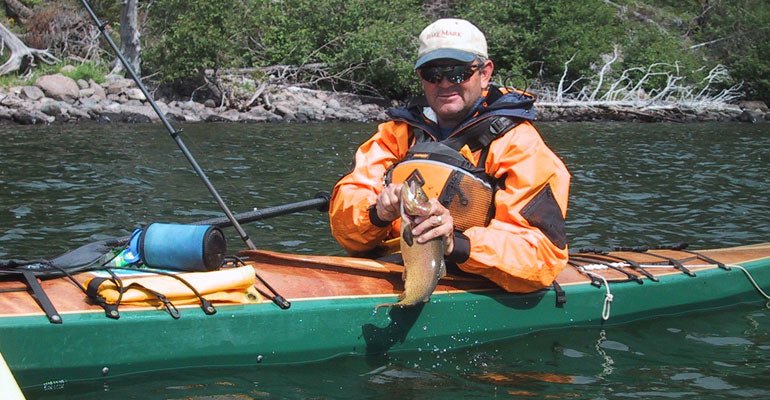 Scott C. has caught a fish on the Yellowstone from his Chesapeake 18 wooden kayak
