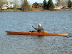 Ulrich W. paddling his Chesapeake 18 wooden kayak on a lake in Ontario Thumbnail