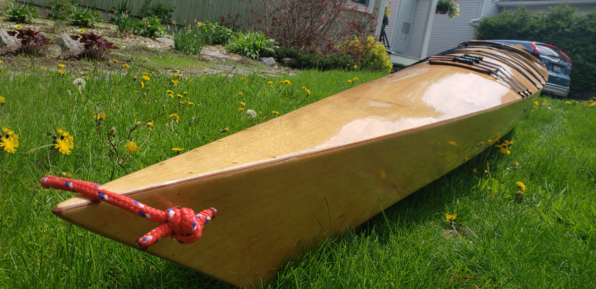 A close-up view of Glenn C's Chesapeake 18 wooden kayak