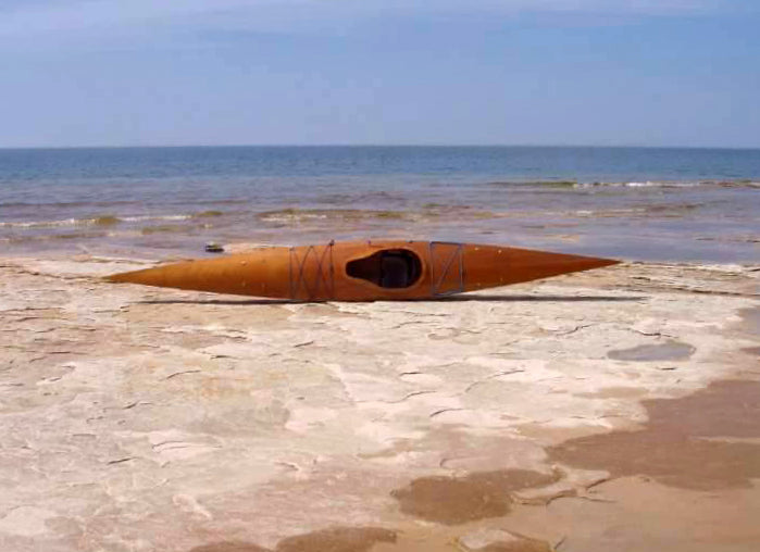 A Chesapeake 18 wooden kayak built by Ryan B. on Mosquito Beach at Pictured Rocks National Lakeshore