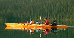 Brett R. and a partner paddling his Chesapeake Double wooden kayak loaded up for adventure Thumbnail