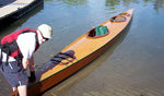 A Chesapeake Double wooden kayak built by John H. at the launching area Thumbnail