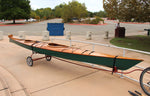 A Chesapeake Double wooden kayak built by Robert M. on a bicycle trailer in Sacramento, California Thumbnail