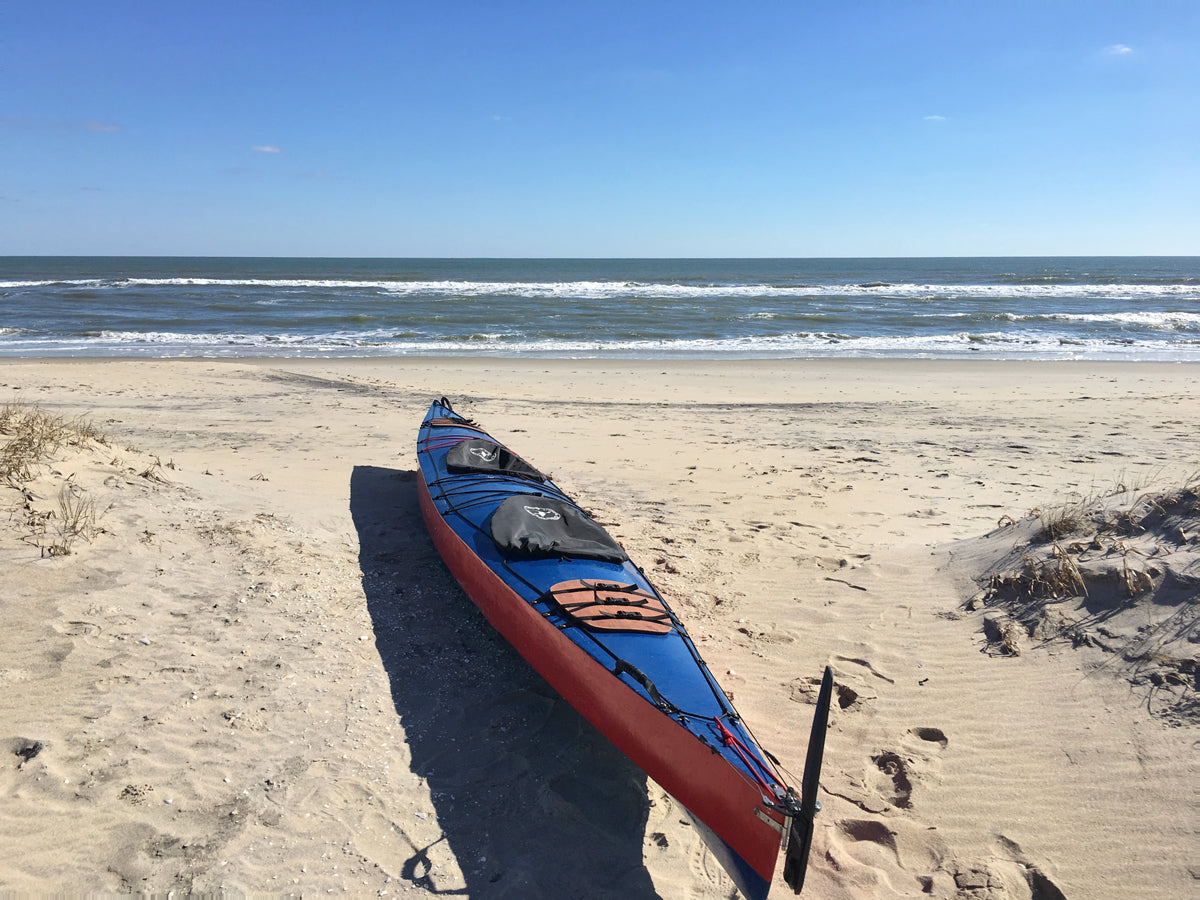 Doug F's Chesapeake Double wooden kayak on the sand at Assateague National Seashore