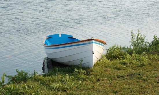 Brightly painted Chester Yawl awaiting its owner