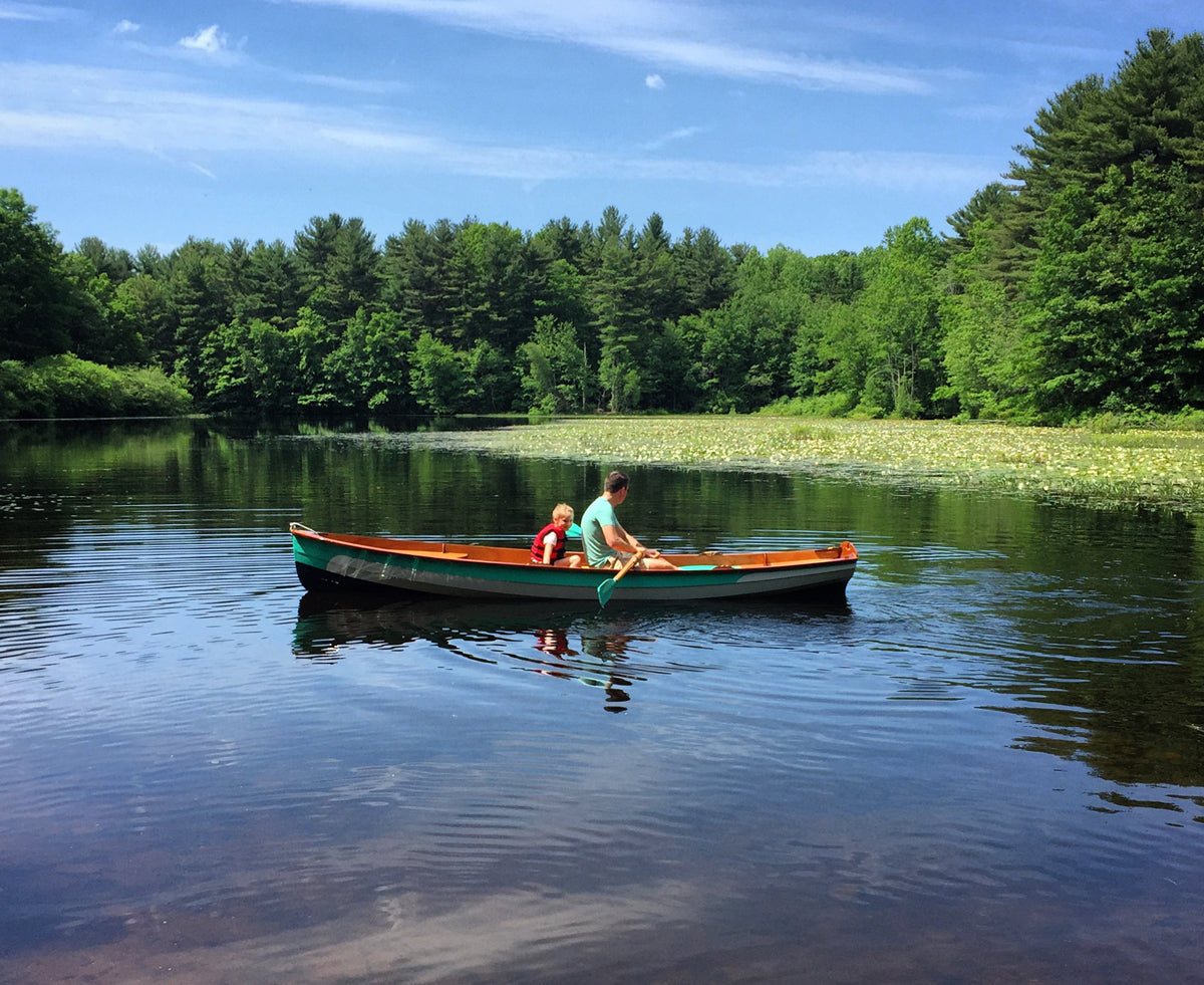 James F. and child on the maiden voyage of his Chester Yawl.