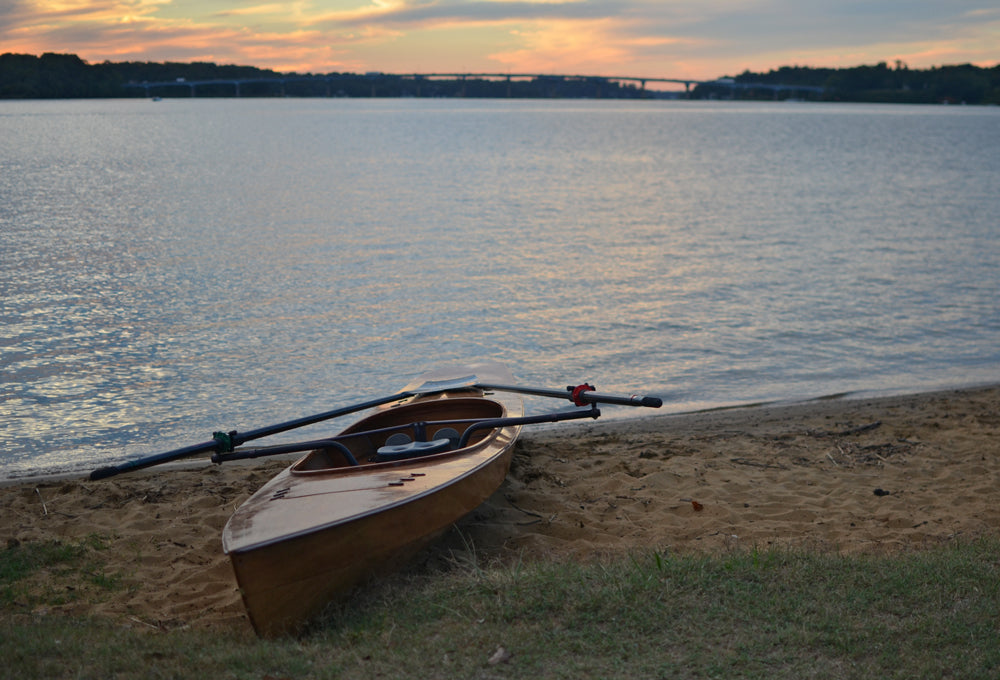 An Expedition Wherry beached on the Severn River at sunset.