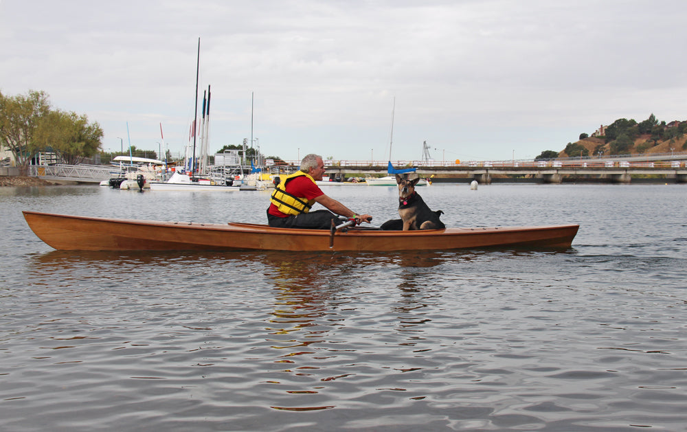 Two dogs being chauffeured on an Expedition Wherry in Sacramento, California.