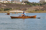 Joey paddling an Expedition Wherry in Newport Beach, California. Thumbnail