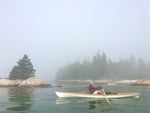 In foggy Brooklin, Maine, Christine Y. rows among the islands in her Expedition Wherry. Thumbnail