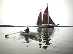 The schooner ANGELIQUE comes to rest as Christine Y. rows by in her Expedition Wherry. Thumbnail