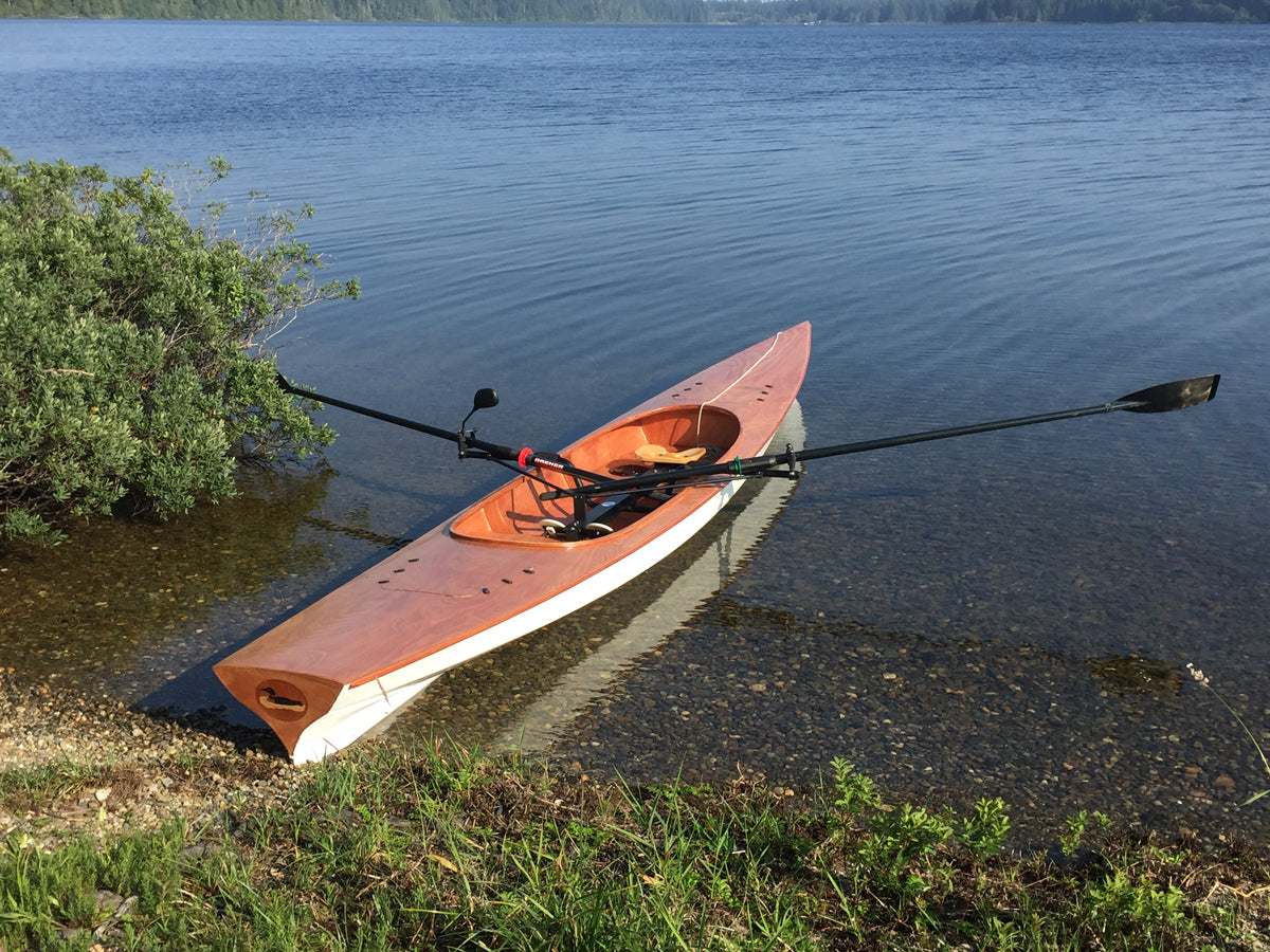 Expedition Wherry built by Jim S. awaits launch on Lake Ozette in Olympic National Park, Washington.  Note the Loon detail on the transom.