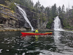 An Expedition Wherry waiting beneath the waterfalls at Teakeme Arm Provincial Park in British Columbia. Thumbnail