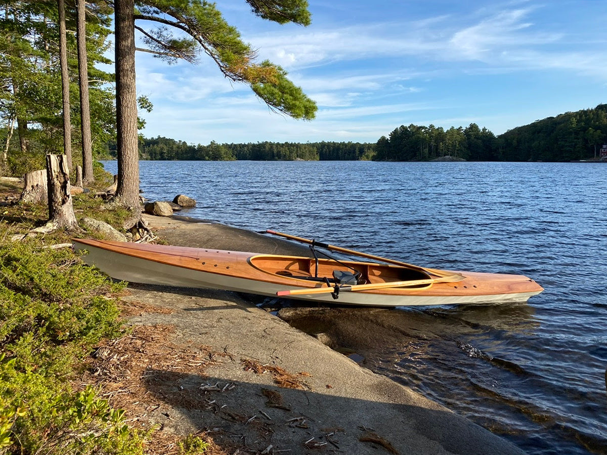 Peter W. built this Expedition Wherry at rest on the shore of Megunticook Lake in Camden, Maine.