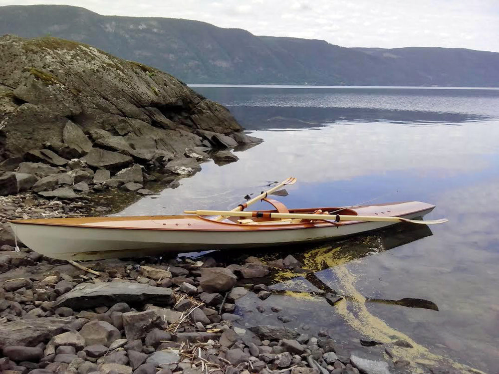 An Expedition Wherry pulled ashore in Flagstad, Norway.