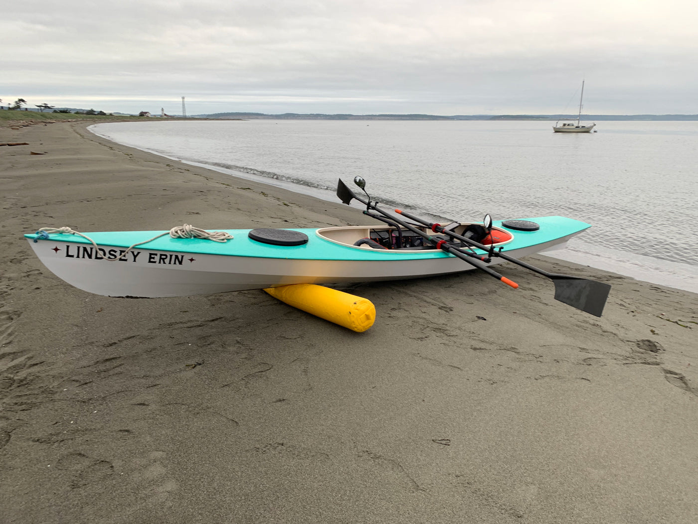 The LINDSEY ERIN is an Expedition Wherry built by Richard D.  Here it awaits the start of the Rat Island Regatta. 