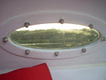 Ports on both sides of the Faering Cruiser provide light below, even when the hatch is closed due to bugs or inclement weather.  Thumbnail