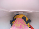 There is sufficient foot room in the aft compartment of the Faering Cruiser. Thumbnail