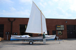 Faering Cruiser has a single balanced 125-sq. ft. lug sail. Lazyjacks will move the spars and sail out of the way when oars become the propulsion method of choice. Thumbnail