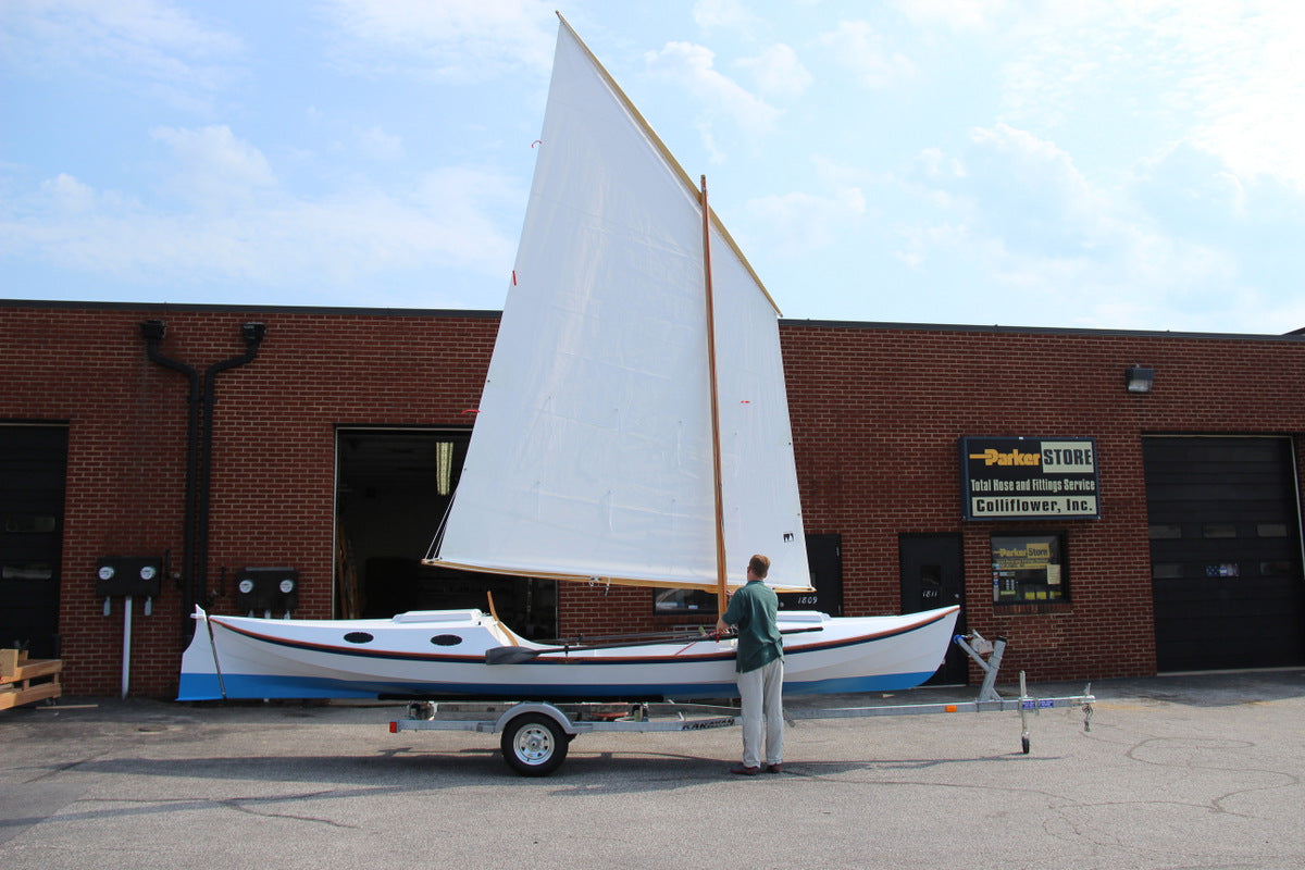 Faering Cruiser has a single balanced 125-sq. ft. lug sail. Lazyjacks will move the spars and sail out of the way when oars become the propulsion method of choice.