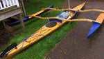 A Great Auk 17 sea kayak with a CLC Sail Rig mounted for conversion for trimaran sailing Thumbnail