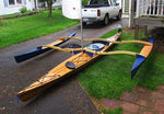 A Great Auk 17 sea kayak fitted with a CLC Sail Rig for trimaran sailing Thumbnail