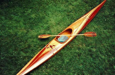 An finely patterned Expedition Single wooden kayak built by Nick S.