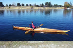 Paddling a Guillemot Single wooden kayak Thumbnail