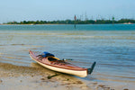 A Guillemot single wooden kayak bulit by Lee F. with a stern-mounted rudden Thumbnail