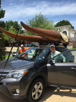 Ready to roll: Dan S. and a friend with Guillemot Single wooden kayak loaded on the cartop Thumbnail