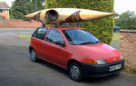 Cartopping a Guillemot Single wooden kayak built by Sam B. Thumbnail
