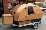 The Integrated Cargo Carrier fits  neatly below the Teardrop Camper and has 23 cubic feet of storage space. Thumbnail