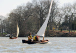 Three med sailing a Jimmy Skiff. Thumbnail