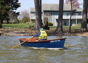 One man rowing a CLC Jimmy Skiff.