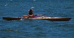 A woman paddling a Chesapeake 16LT wooden kayak Thumbnail