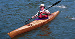 A man paddling a Chesapeake 16LT wooden kayak Thumbnail