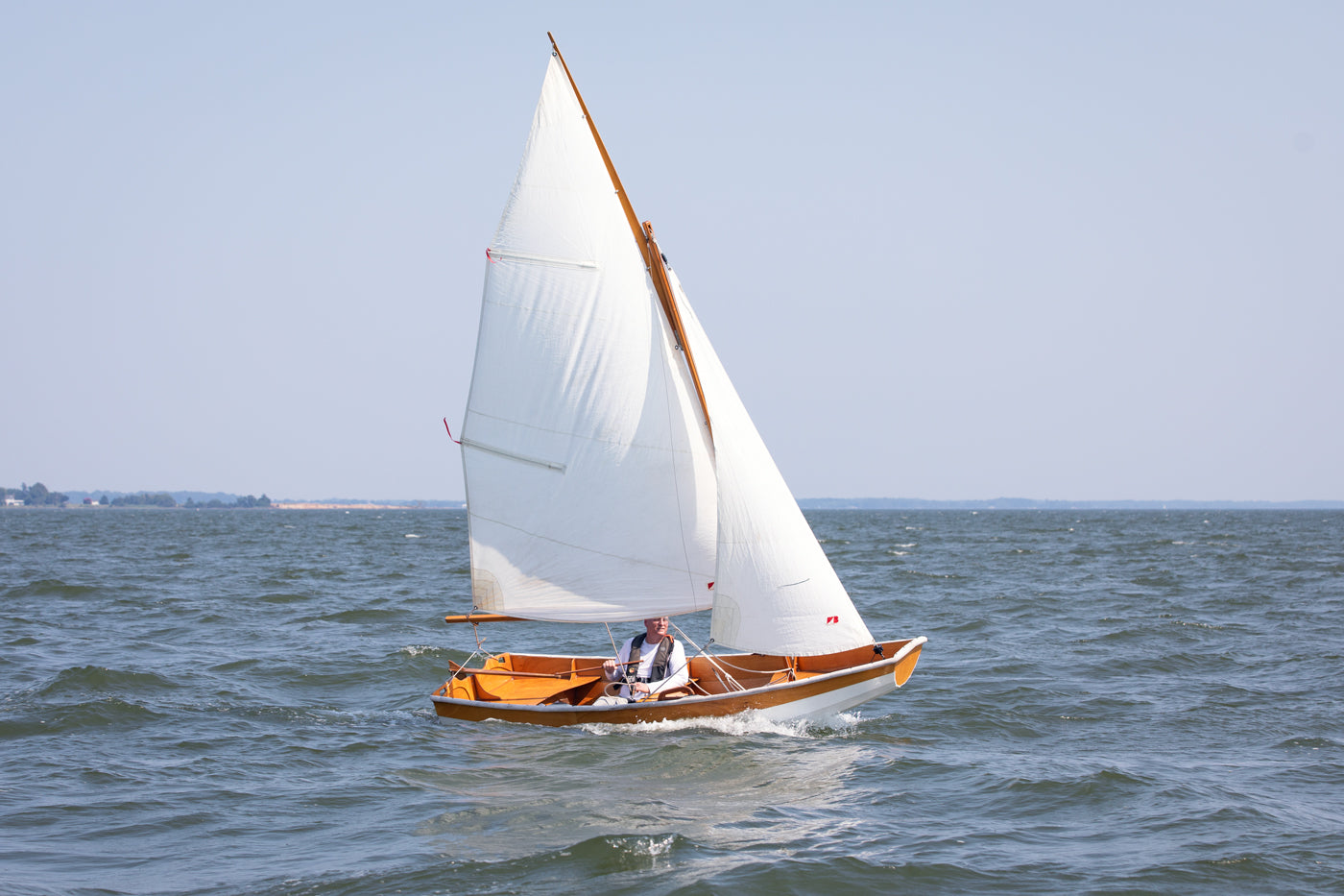 Passagemaker Dinghy with a Sloop Rig, sailing Crab Alley Bay, MD