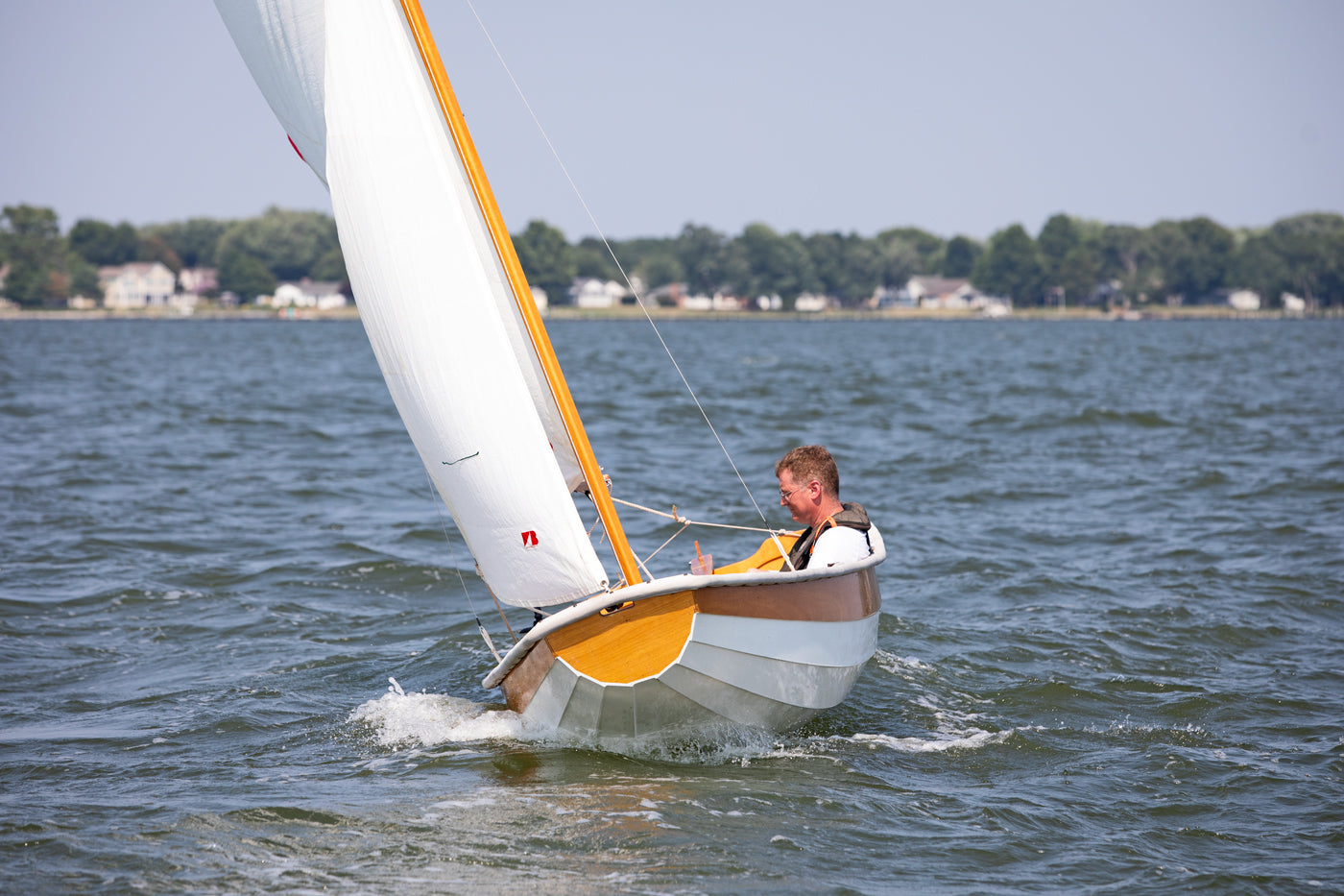 Passagemaker Dinghy with a Sloop Rig, sailing Crab Alley Bay, MD