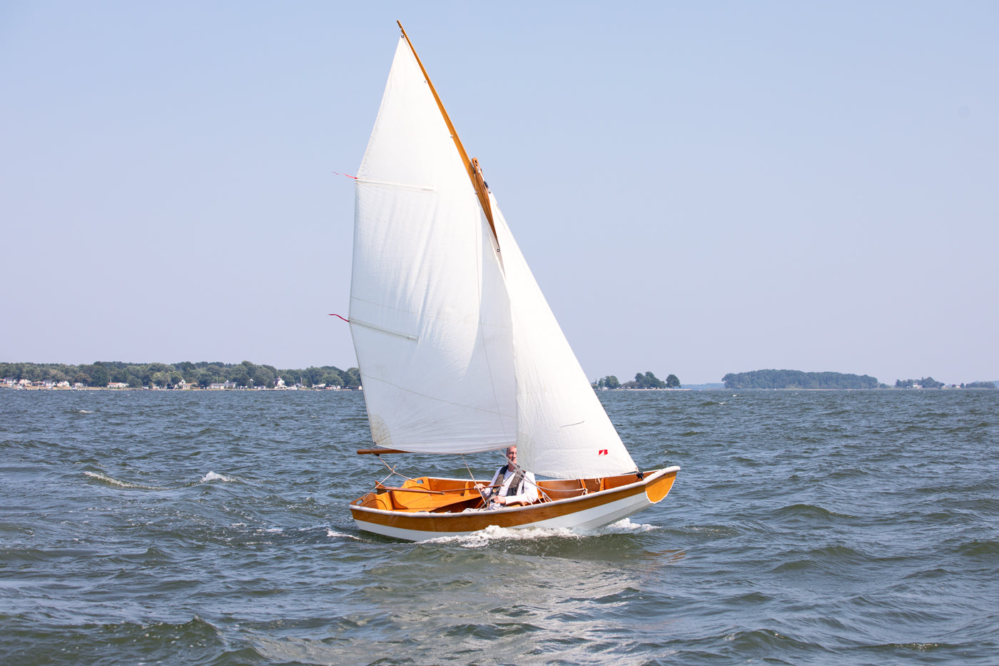 Passagemaker Dinghy with a Sloop Rig, sailing Crab Alley Bay, MD