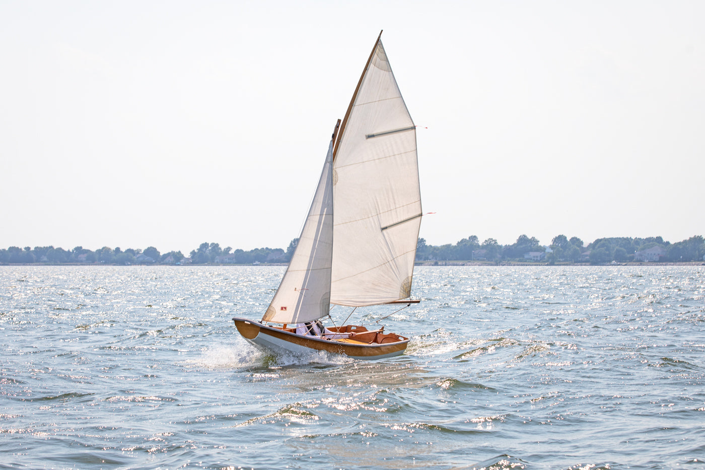 Passagemaker Dinghy with a Sloop Rig, sailing Crab Alley Bay, MD