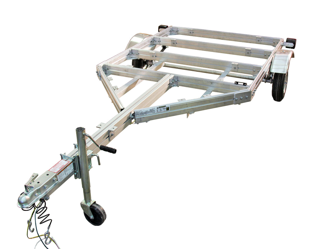 A silver flatbed trailer with wheels and hitch, designed for use with a teardrop camper.