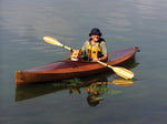 A man and his dog enjoying a paddle in a Wood Duck 10 kayak Thumbnail