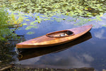 Andrew R's Wood Duck 10 kayak floating among the lily pads in Arlington, MA Thumbnail