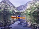 Cheryl J. paddling her Wood Duck 10 kayak on a lake in the Tetons Thumbnail