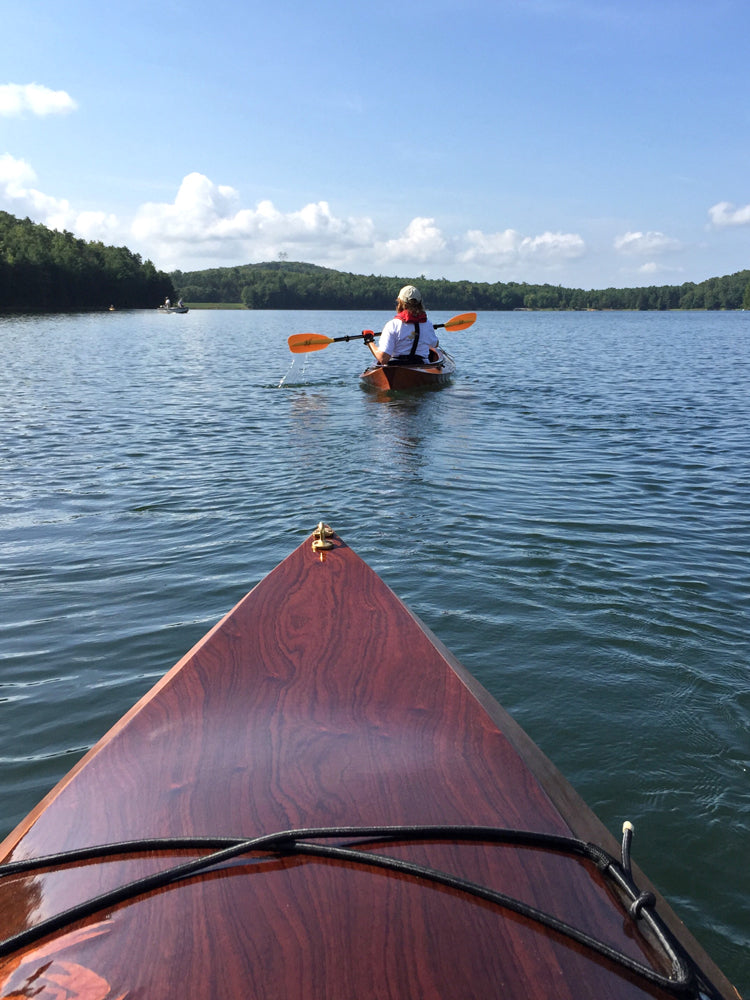 Looking over the bow of his Wood Duck 10 kayak at another just ahead from Mike H.