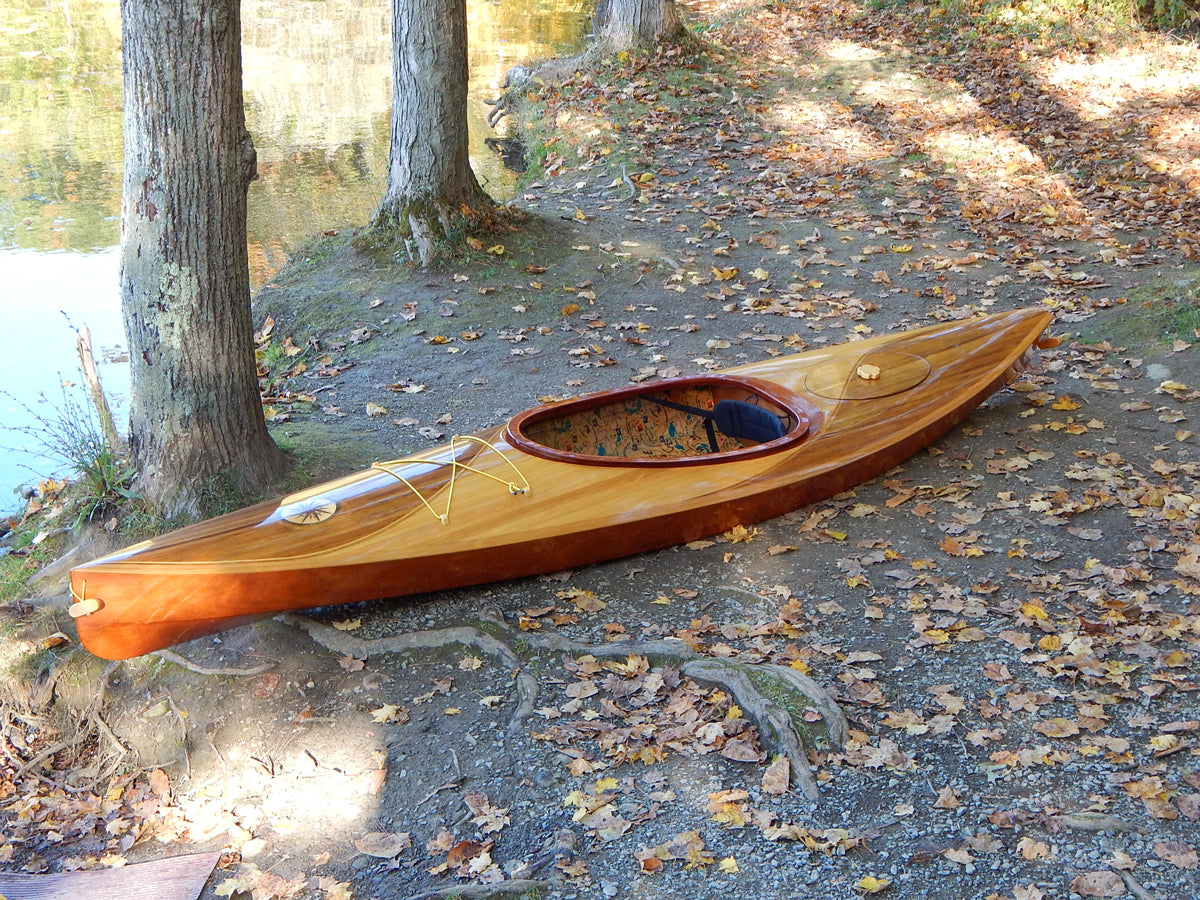 A Wood Duck 12 Hybrid kayak built by David F. on the bank of Canadice Lake, Rochester, NY