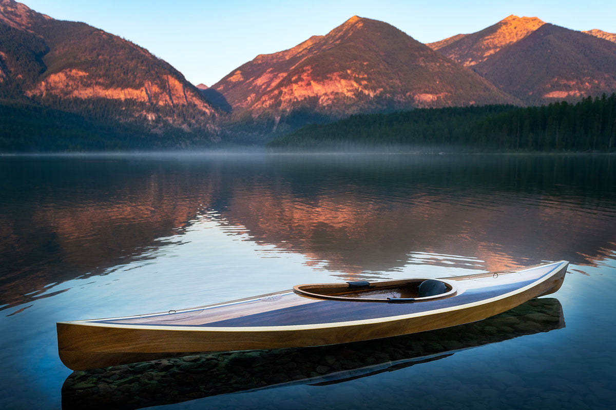 A Wood Duck 14 Hybrid kayak built by Dave L. at rest on Holland Lake in  Montana